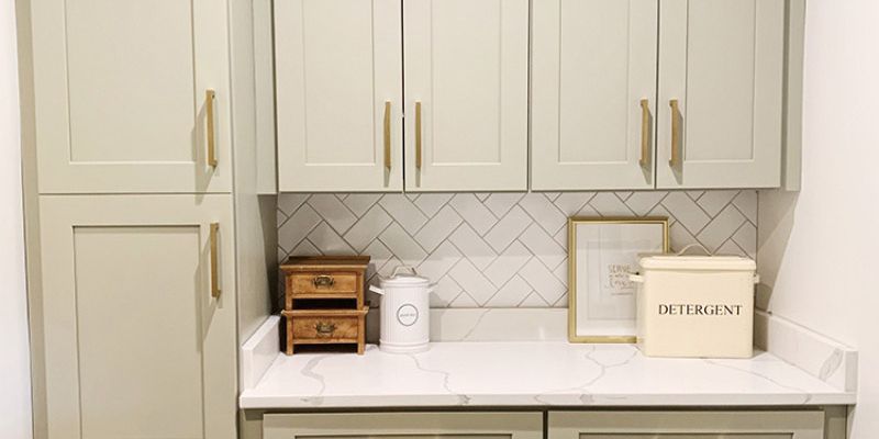Upgraded storage solutions in the laundry room for small home renovation projects.
